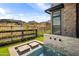 Private backyard with a water feature and modern fence at 23491 N 125Th Pl, Scottsdale, AZ 85255