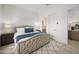 Spacious bedroom with tufted headboard and neutral decor at 23491 N 125Th Pl, Scottsdale, AZ 85255