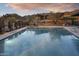 Resort-style pool with mountain views in the background at 23491 N 125Th Pl, Scottsdale, AZ 85255