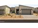 Modern home with a two-car garage and landscaped front yard at 23491 N 125Th Pl, Scottsdale, AZ 85255