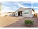 Spacious backyard with gravel landscaping and view of the house at 25412 N 144Th Dr, Surprise, AZ 85387