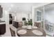 Dining area with a round wooden table and four chairs at 25412 N 144Th Dr, Surprise, AZ 85387