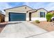 Single-story home with a two-car garage and landscaped front yard at 25412 N 144Th Dr, Surprise, AZ 85387