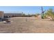 Large backyard with gravel and desert landscape at 274 E Mckellips Blvd, Apache Junction, AZ 85119