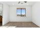 Simple bedroom with carpeted floor and a window with a view at 274 E Mckellips Blvd, Apache Junction, AZ 85119