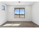 Bright bedroom with large window and carpeted floor at 274 E Mckellips Blvd, Apache Junction, AZ 85119