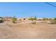 Single-story home with stucco exterior, desert landscaping, and mountain views at 274 E Mckellips Blvd, Apache Junction, AZ 85119