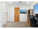 Bright home office features wood cabinets, comfy chair, and view at 274 E Mckellips Blvd, Apache Junction, AZ 85119