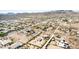 Aerial view showing a neighborhood with houses and desert landscape at 27511 N 33Rd Ave, Phoenix, AZ 85083