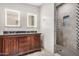 Modern bathroom with double vanity and walk-in shower at 27511 N 33Rd Ave, Phoenix, AZ 85083