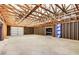 Spacious garage interior with high ceilings and large overhead door at 27511 N 33Rd Ave, Phoenix, AZ 85083