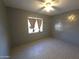 Simple bedroom with light walls and wood-look floors at 303 W 13Th St, Eloy, AZ 85131