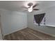 Spacious bedroom with ceiling fan and new laminate flooring at 303 W 13Th St, Eloy, AZ 85131