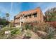 Brick building with landscaped grounds and awnings at 304 W Roosevelt St # 102, Phoenix, AZ 85003