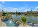 Stunning aerial view of waterfront home with pool at 3180 S Greythorne Way, Chandler, AZ 85248