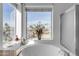 Spa-like bathroom with large tub and water views at 3180 S Greythorne Way, Chandler, AZ 85248