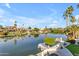 Stunning canal views with boats and waterfront homes at 3180 S Greythorne Way, Chandler, AZ 85248