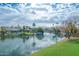 Waterfront property with serene canal views and lush landscaping at 3180 S Greythorne Way, Chandler, AZ 85248