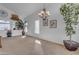 Elegant dining room with a chandelier and large window at 3180 S Greythorne Way, Chandler, AZ 85248