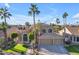 Two-story home with a three-car garage and palm trees at 3180 S Greythorne Way, Chandler, AZ 85248