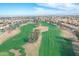 Aerial view of a lush green golf course at 3180 S Greythorne Way, Chandler, AZ 85248