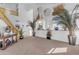 High ceiling living room with staircase and decorative wall art at 3180 S Greythorne Way, Chandler, AZ 85248