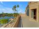 Spacious patio with lake views and access to bedroom at 3180 S Greythorne Way, Chandler, AZ 85248