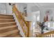 Open staircase offering a view to the living area below at 3180 S Greythorne Way, Chandler, AZ 85248