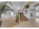 Elegant staircase leading to the upper level of the home at 3180 S Greythorne Way, Chandler, AZ 85248