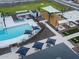 Aerial view of community pool, playground, and shaded seating areas at 3403 E Audrey Dr, San Tan Valley, AZ 85143