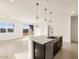 Kitchen island featuring a stainless steel dishwasher, drop in sink, and pendant lighting at 3403 E Audrey Dr, San Tan Valley, AZ 85143