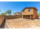 Large backyard with a circular patio and a view of neighboring houses at 3745 W Carol Ann Way, Phoenix, AZ 85053