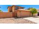 Two-story house with tan exterior, attached garage, and small front yard at 3745 W Carol Ann Way, Phoenix, AZ 85053