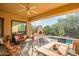 Spacious patio with seating area and pool access at 40822 N Harbour Town Way, Anthem, AZ 85086