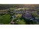 Aerial view of community with clubhouse, golf course, and pool at 4142 E Ravenswood Dr, Gilbert, AZ 85298