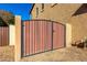 Private gated backyard access with decorative accents at 4142 E Ravenswood Dr, Gilbert, AZ 85298