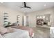 Bright bedroom with mirrored closet doors and a desk at 4142 E Ravenswood Dr, Gilbert, AZ 85298