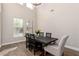 Elegant dining room with a large table and high ceilings at 4142 E Ravenswood Dr, Gilbert, AZ 85298