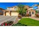 Two-story house with stone accents and a landscaped front yard at 4142 E Ravenswood Dr, Gilbert, AZ 85298