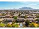 Neighborhood view with mountains in the background at 4142 E Ravenswood Dr, Gilbert, AZ 85298