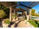 Lush pergola walkway leading to the pool area at 4142 E Ravenswood Dr, Gilbert, AZ 85298