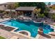 Relaxing pool area with a pergola and fire pit at 4142 E Ravenswood Dr, Gilbert, AZ 85298