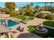 Resort-style pool and spa with ample patio space for relaxation at 4142 E Ravenswood Dr, Gilbert, AZ 85298