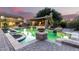 Luxury backyard oasis featuring a sparkling pool, pergola, and spacious patio at 4142 E Ravenswood Dr, Gilbert, AZ 85298