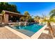 Resort-style pool and spa with expansive patio at 4142 E Ravenswood Dr, Gilbert, AZ 85298