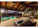 Inviting poolside patio with comfortable seating and string lights at 4142 E Ravenswood Dr, Gilbert, AZ 85298