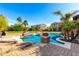 Stunning pool with spacious deck and landscaping at 4142 E Ravenswood Dr, Gilbert, AZ 85298