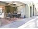 Outdoor kitchen and dining area with grill, tables, and chairs at 4201 N 20Th St # 205, Phoenix, AZ 85016