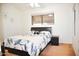 Bright bedroom with double bed and window at 4201 N 20Th St # 205, Phoenix, AZ 85016