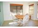 Small dining area with wood table and four chairs at 4201 N 20Th St # 205, Phoenix, AZ 85016